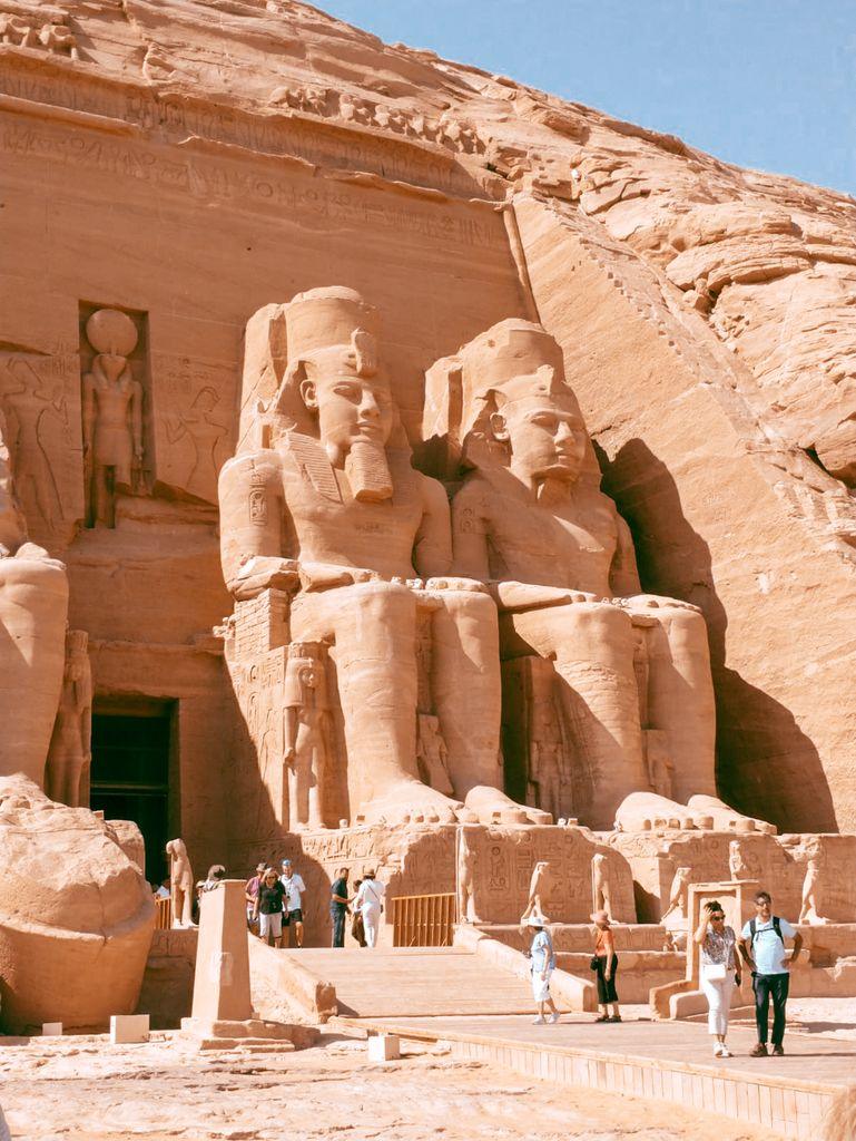 Explore the grandeur of the Abu Simbel Temple with its towering ancient statues in Egypt.